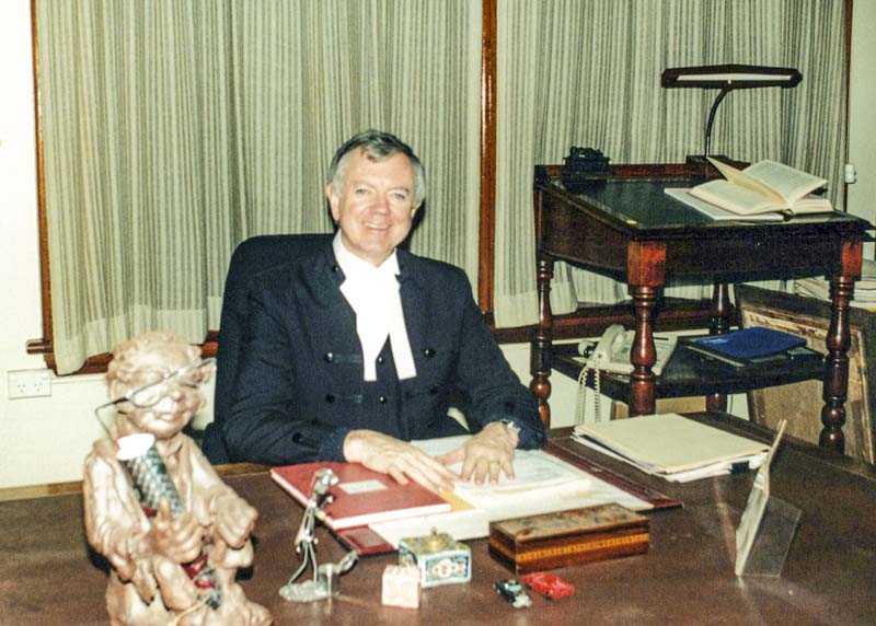 Joseph Anthony Moore at his desk