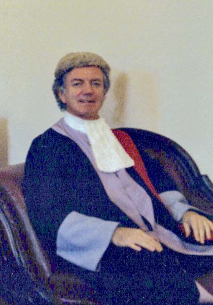 Joseph Anthony Moore seated in judicial robes