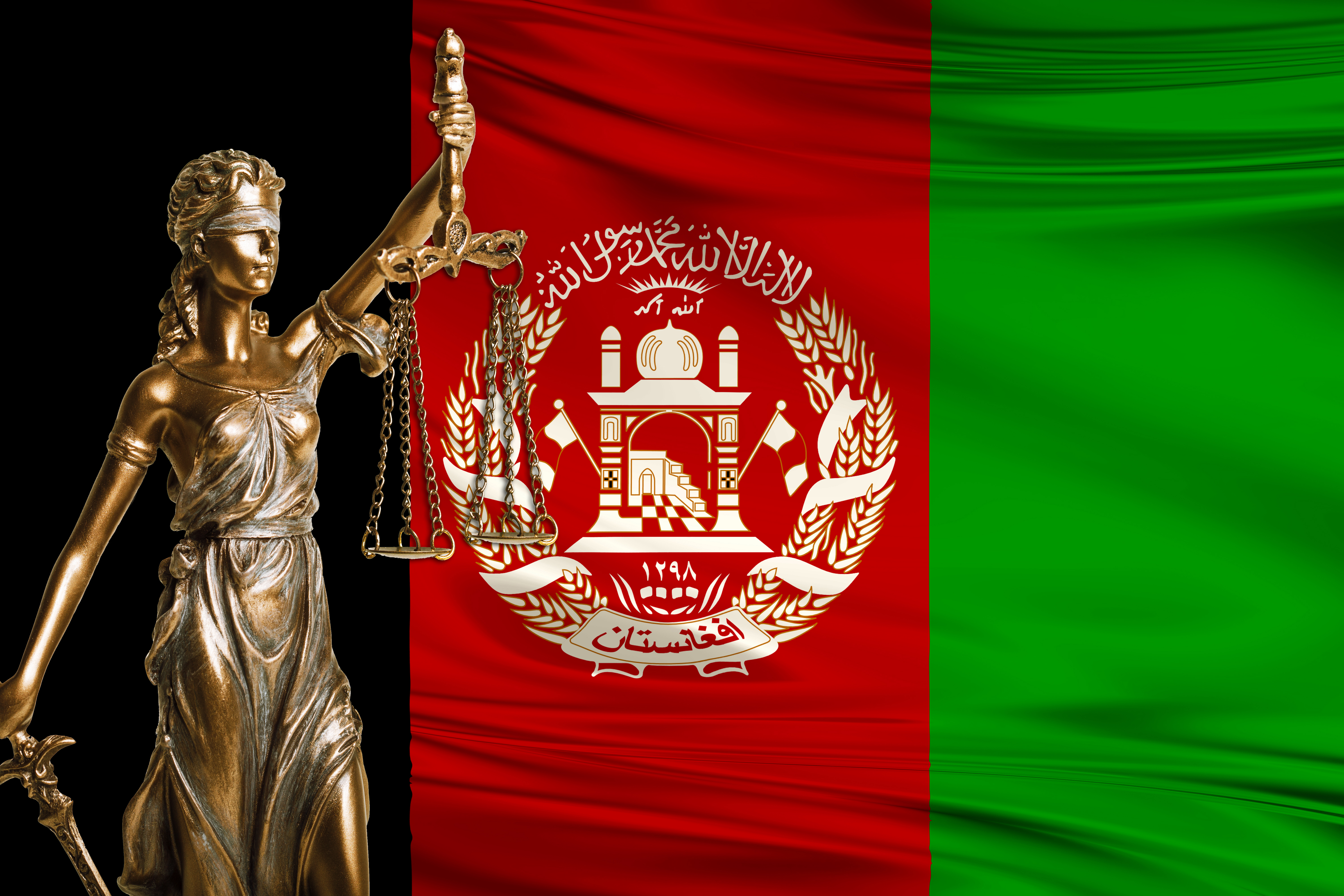 Lady justice with the Afghan flag