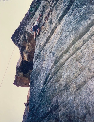Neil Williams climbing mountain