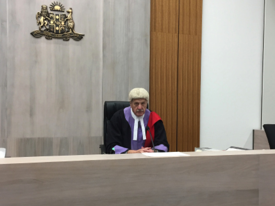 portrait of Judge Gordon Lerve sitting in court